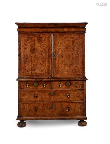A Queen Anne walnut and feather banded cabinet on chest, cir...