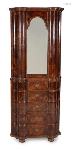 A figured walnut corner cupboard, second quarter 18th centur...