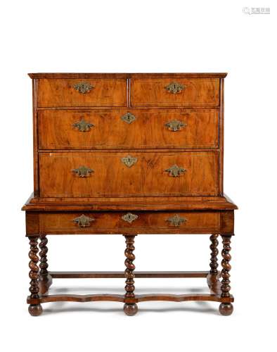 A walnut and line inlaid chest on stand, the chest circa 170...