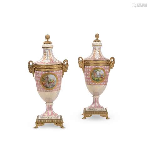 A pair of French porcelain Serves-style pink-ground and gilt...