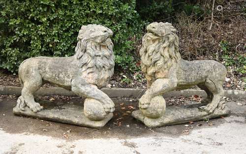 A pair of large stone composition models of lions