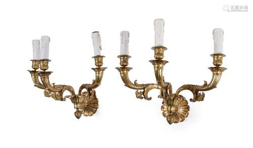 A pair of French gilt bronze three light wall appliques in R...