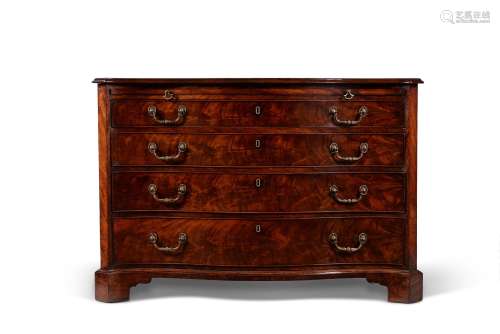 A George III mahogany serpentine fronted commode