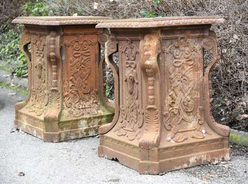 A pair of French cast iron pedestals