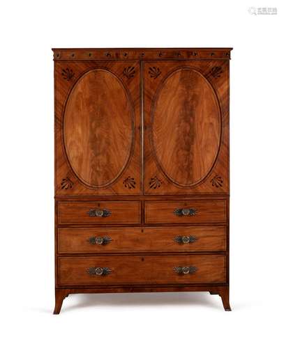 A Regency mahogany and ebony inlaid linen press