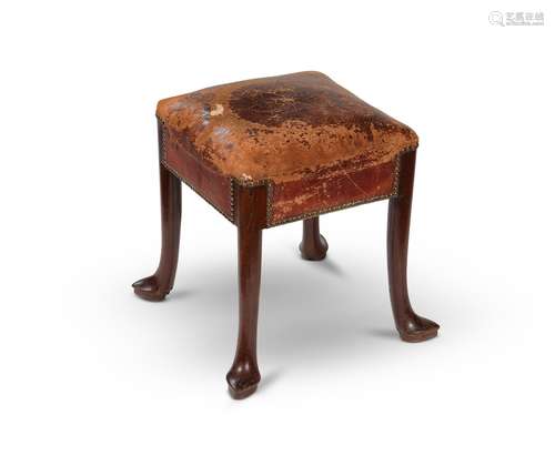 A George II mahogany and leather upholstered stool