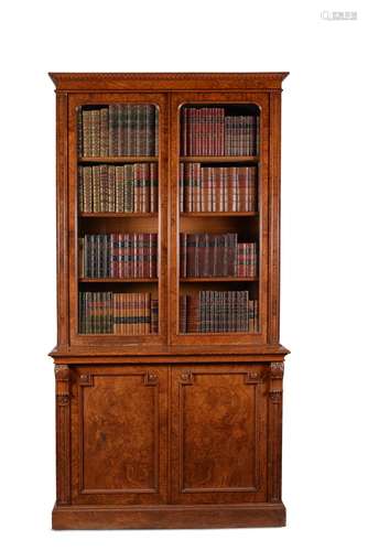 An early Victorian burr oak bookcase, circa 1845, stamped 'J...