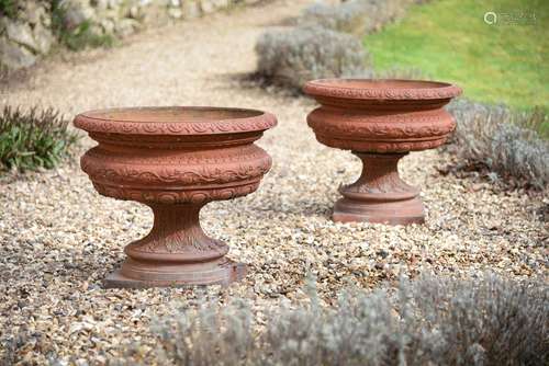 A pair of Victorian terracotta garden urns