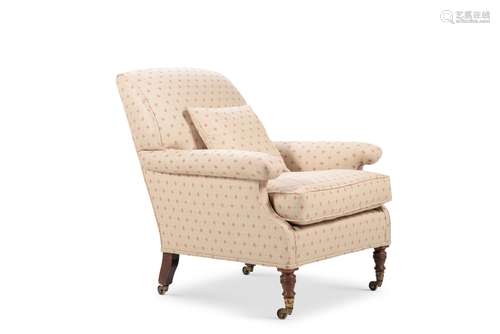 A Victorian walnut and upholstered armchair by Howard & Sons