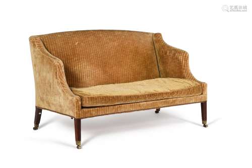 A George III mahogany and upholstered sofa
