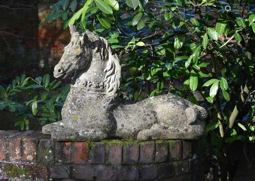 A pair of stone composition models of recumbent horses