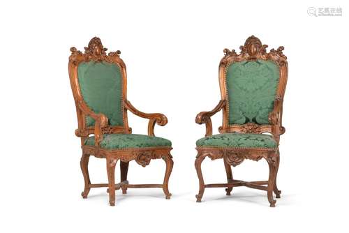 A pair of Continental carved walnut armchairs, , first half ...