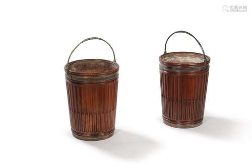 A pair of mahogany peat buckets