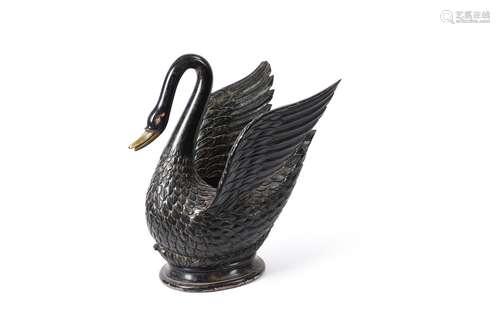 A large and unusual carved and ebonised wood model of a swan...