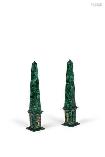 A pair of malachite veneered and gilt metal mounted obelisks...