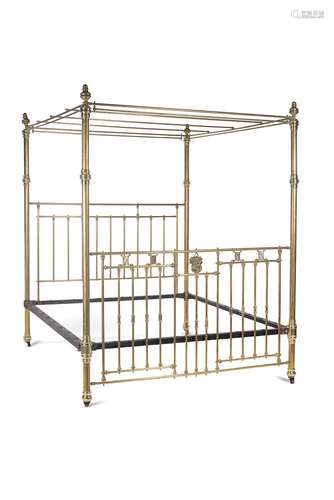 A Victorian brass four post bed