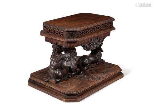 A carved oak jardinière table, third quarter 19th century an...