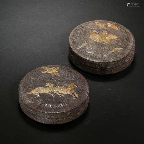 A PAIR OF CHINESE TANG DYNASTY SILVER POWDER BOXES PARTIALLY...