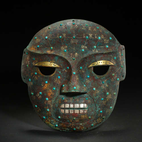 CHINESE BRONZE MASK INLAID WITH GOLD AND SILVER,  WARRING ST...