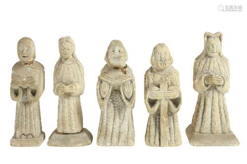 A GROUP OF FIVE MEDIEVAL STYLE CARVED LIMESTONE FIGURES