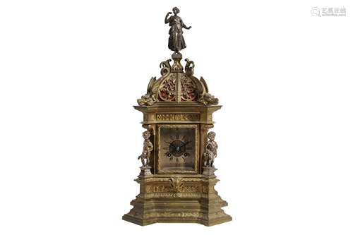 A LATE 19TH CENTURY GILT AND SILVERED METAL TABLE CLOCK IN T...