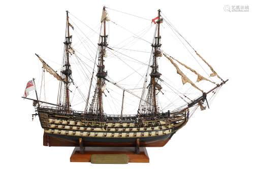 A FIRST HALF 20TH CENTURY PAINTED WOOD MODEL OF HMS VICTORY