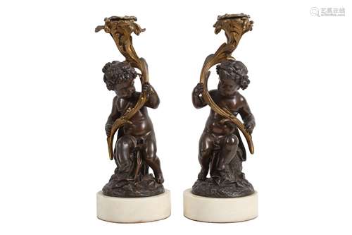 A PAIR OF MID 19TH CENTURY FRENCH BRONZE AND ORMOLU CANDLEST...