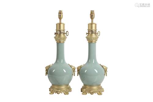 A PAIR OF LATE 19TH CENTURY CELADON PORCELAIN VASES ADAPTED ...