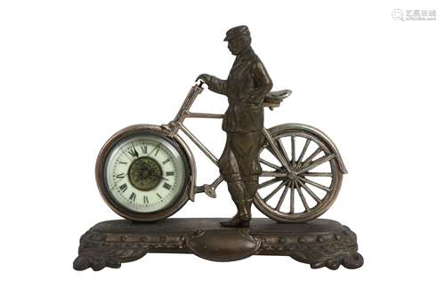 AN EARLY 20TH CENTURY AMERICAN BRONZE BICYCLE CLOCK BY ANSON...