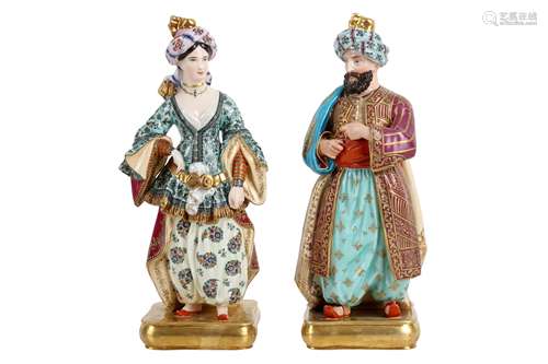 A PAIR OF MID 19TH CENTURY PARIS PORCELAIN FIGURAL FLASKS OF...