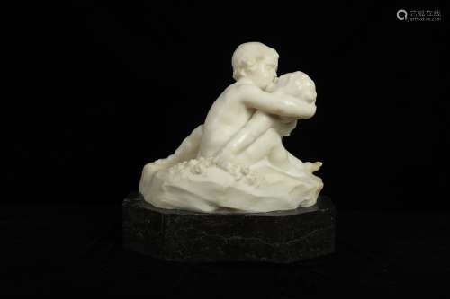 AN EARLY 20TH CENTURY ITALIAN ALABASTER GROUP OF TWO CHERUBS...