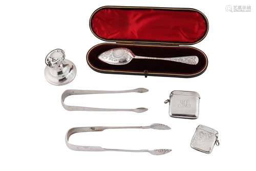 A mixed group of sterling silver flatware and vertu