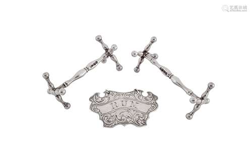 A pair of early Victorian sterling silver knife rests, Londo...