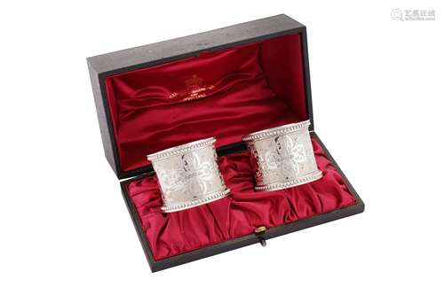 A cased pair of Victorian sterling silver napkin rings, 1895...