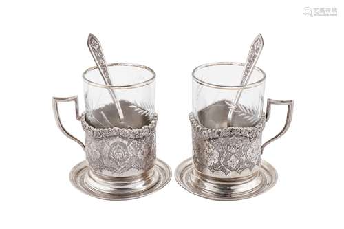 A pair of mid-20th century Iranian (Persian) silver tea glas...