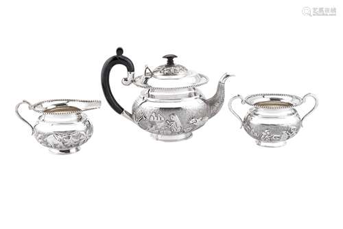 A mid-20th century Anglo-Indian silver three-piece tea servi...