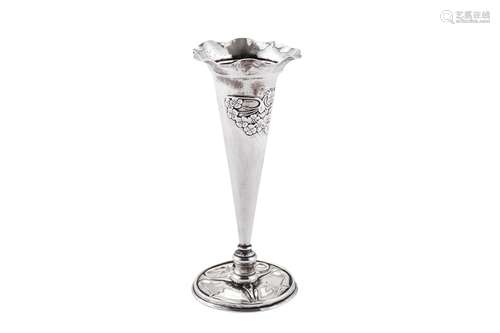 A late Victorian 'Arts and Crafts' sterling silver flower va...