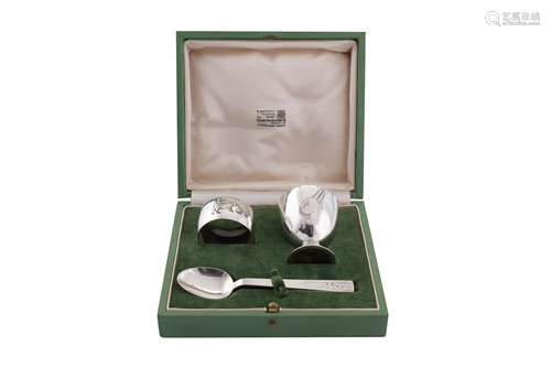 A cased George VI novelty sterling silver christening set, L...