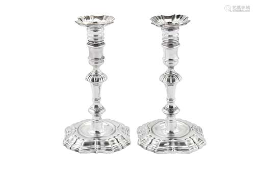 A pair of George II sterling silver candlesticks, London 173...