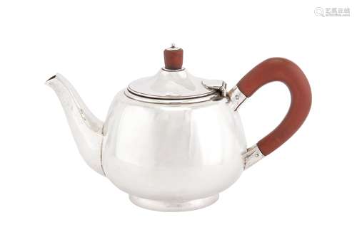 An Elizabeth II sterling silver ‘hand crafted’ teapot, Birmi...