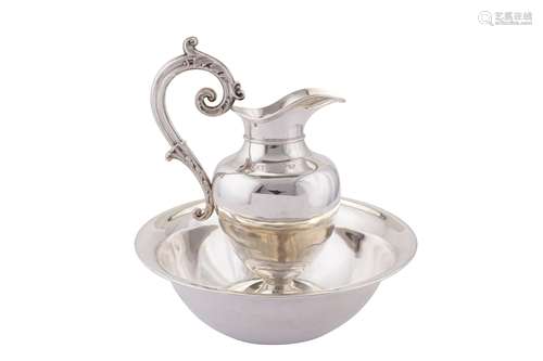 A late 19th century French 950 standard silver water ewer an...