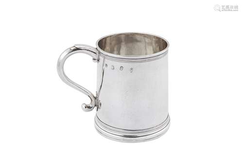 A Queen Anne Britannia standard silver mug, London 1710 by J...