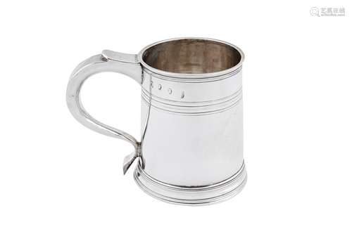 A George I Britannia standard silver mug, London 1715 by Rob...