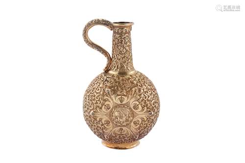 A late 19th century Anglo – Indian unmarked silver gilt ewer...