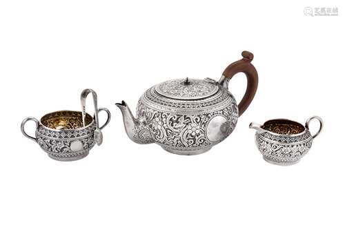 A Victorian three-piece bachelor tea service, London 1883 by...