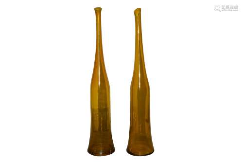 A PAIR OF 'SHIFA' AMBER GLASS BOTTLE VASES