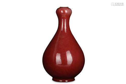 A CHINESE COPPER RED-GLAZED GARLIC MOUTH VASE.