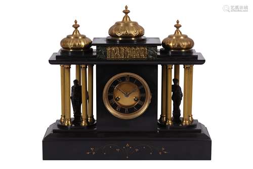 A LATE VICTORIAN SLATE BASED BLACK MARBLE MANTEL CLOCK