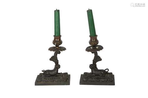 A PAIR OF REGENCY PATINATED BRONZE CANDLESTICKS