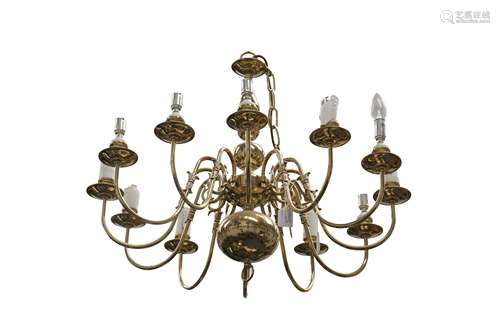 A DUTCH STYLE BRASS TWELVE LIGHT CHANDELIER